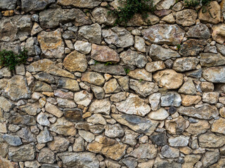 imagen textura pared de piedra con piedras de distintos tamaños y colores