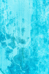 Background, texture of stained painted concrete dirty wall in blue, turquoise color. Photo after renovation, concept.