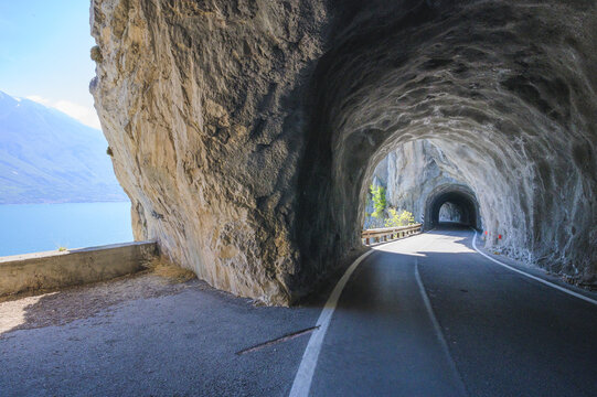 STRADA DELLA FORRA, narrow Italian road with tunnel in the mountains, Lake Garda, Italy