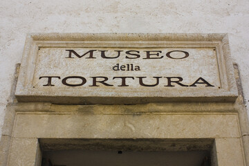 Street sign of Museum of Torture in San Marino