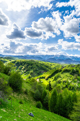 Fototapeta na wymiar landscape with mountains, blue sky and clouds