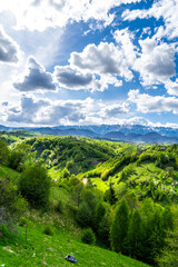 Fototapeta na wymiar landscape with mountains, blue sky and clouds