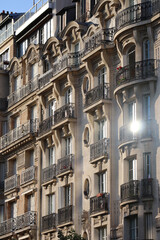 Fototapeta na wymiar Beautiful facades of late 19th century Haussmann buildings in the 7th arrondissement of Paris