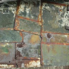 Old metal sheets interconnected, old rusty metal sheets texture