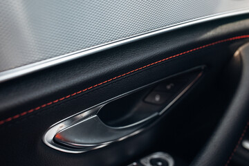 Naklejka premium Stitched door panel in a modern car