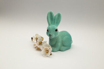 Easter Bunny by the Easter Eggs on a white background