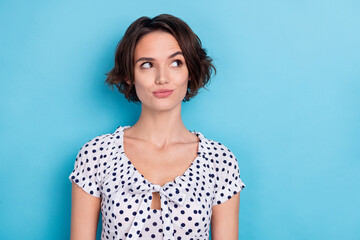 Photo of nice young bob hairdo lady look promo wear dotted blouse isolated on blue color background