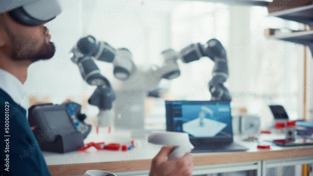 Poster Computer Science Worker in Virtual Reality Headset Holding Controllers and Moving Bionic Claw Under his Control. Man Developing Program for Motion of Robotic Arm. Innovative Technologies Concept