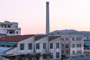 industrial enterprise appearance and factory chimney, Athens