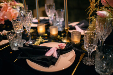 Pink, gold, black Wedding decor at the restaurant.