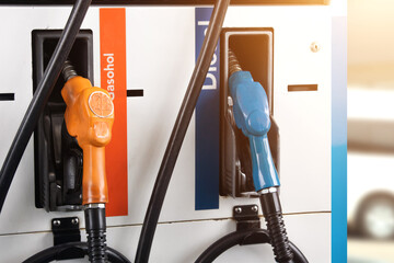 oil nozzle in pump. Gas pump nozzle in petrol station. Fuel nozzle in oil dispenser. Fuel dispenser...