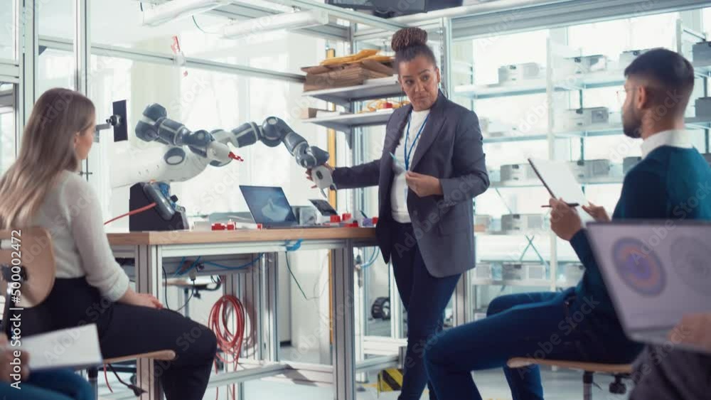 Aufkleber Corporate Meeting Room: Confident Black Female Engineer Talk with Smart Future Developers about Record Breakthrough at Robotics. Computer Science Concept. Moving Camera Shot
