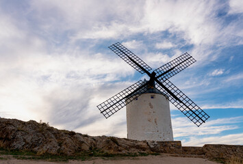 Fototapeta na wymiar Ancient windmills in Castilla la Mancha, Spain, place of tourist interest because of Cervantes' novel, Don Quixote 