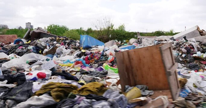 municipal waste dumped in a wild landfill in nature