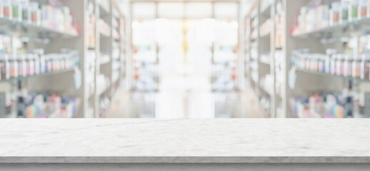 Empty white marble counter top with blur pharmacy drugstore shelves background