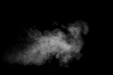 Steam cloud in the form of a bird isolated on a black background. Fog fantasy. Abstract background...