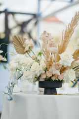 Wedding decor at the restaurant. Pink, gold, many pastel colors. 