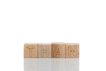 Wooden cubes with letters than on a white background