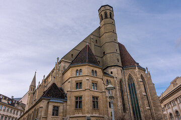 Fototapeta na wymiar Old church in mixed styles in Vienna, Austria