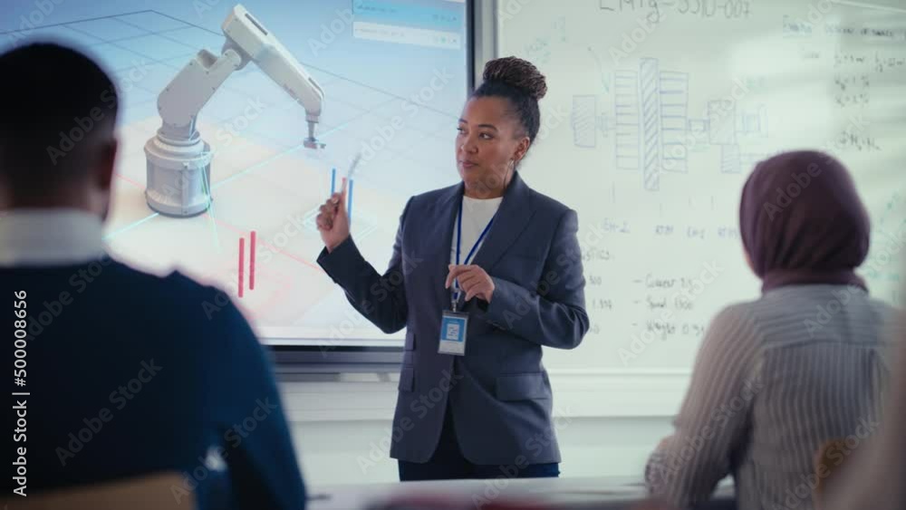 Poster Black Teacher Explain Engineering to Students at University Robotics Lecture Class. She Uses projection screen. Group of Engineers Listen Lecture on Program Development for Robotic Arm. Slow Motion