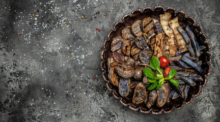 Fried potatoes, Baked purple sweet potatoes with bacon on a metal tray, banner, menu, recipe place for text, top view