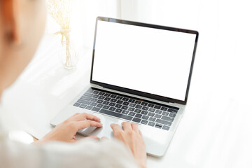 computer screen blank mockup.hand woman work using laptop with white background for advertising,contact business search information on desk at coffee shop.marketing and creative design