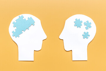 Brain puzzles on two human heads. Communication and connection concept