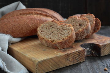 Bread on wooden background