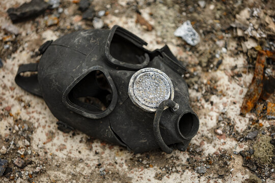 Close-up Burnt Gas Mask On The Ground