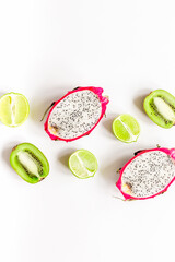 pattern with sliced kiwi and pitaya on white background top view mockup