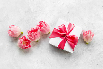 Obraz na płótnie Canvas Fift box with pink ribbon. Women mothers day concept