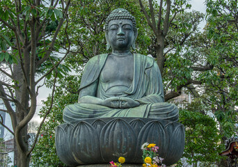Edo period huge bronze statue of Gautama Buddha sitting in Lotus position in Tokyo, Japan