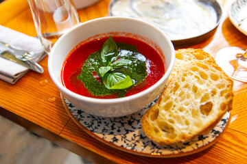 Traditional Andalusian cold soup gaspacho with bread