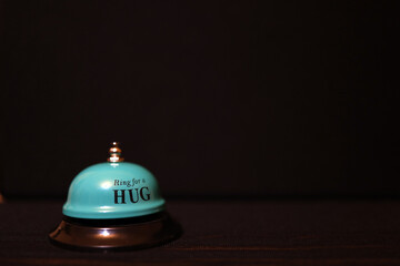 green service bell ring for a hug 