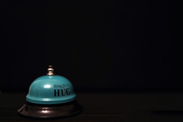 green service bell ring for a hug 