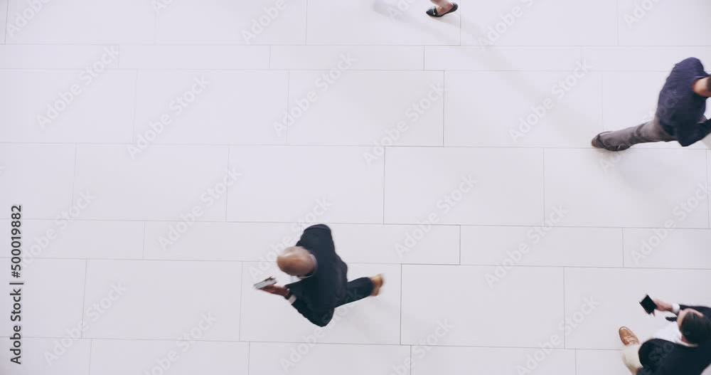 Aufkleber Moving around like busy ants. Overhead of a group of business people walking around on a busy day in a modern office. Diverse crowd walking through a convention at a conference from above
