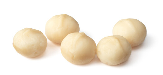 Shelled Macadamia nuts isolated on white background.