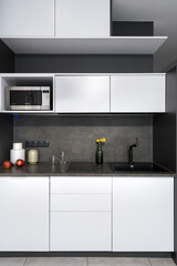 Small size kitchen with furniture and decor
