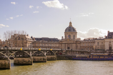 Fototapeta na wymiar View of Institut de France and Pont des Arts over the Seine in Paris, France
