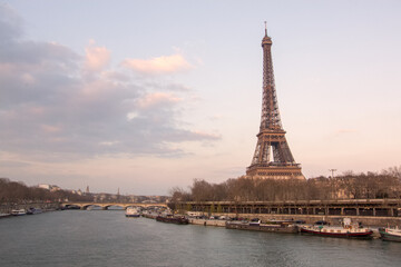 Fototapeta na wymiar View of Eiffel Tower over the Seine in Paris at sunset, France