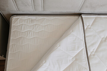 Close up shot of white orthopedic mattress top side surface pattern with a lot of copy space for...