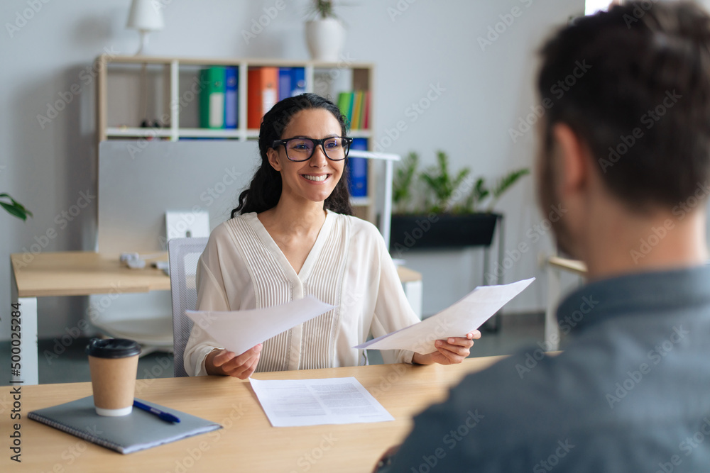 Poster searching for job. human resources manager speaking to employment applicant on work interview, holdi