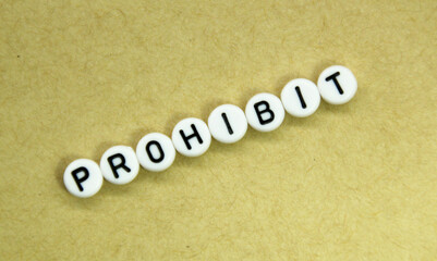 letters in a white circle with the word prohibit
