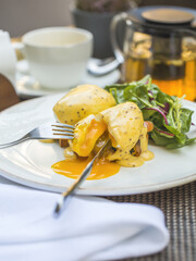 Eggs Benedict with Salmon on Served Table, Restaurant food, Concept food