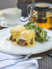 Eggs Benedict with Salmon on Served Table, Restaurant food, Concept food