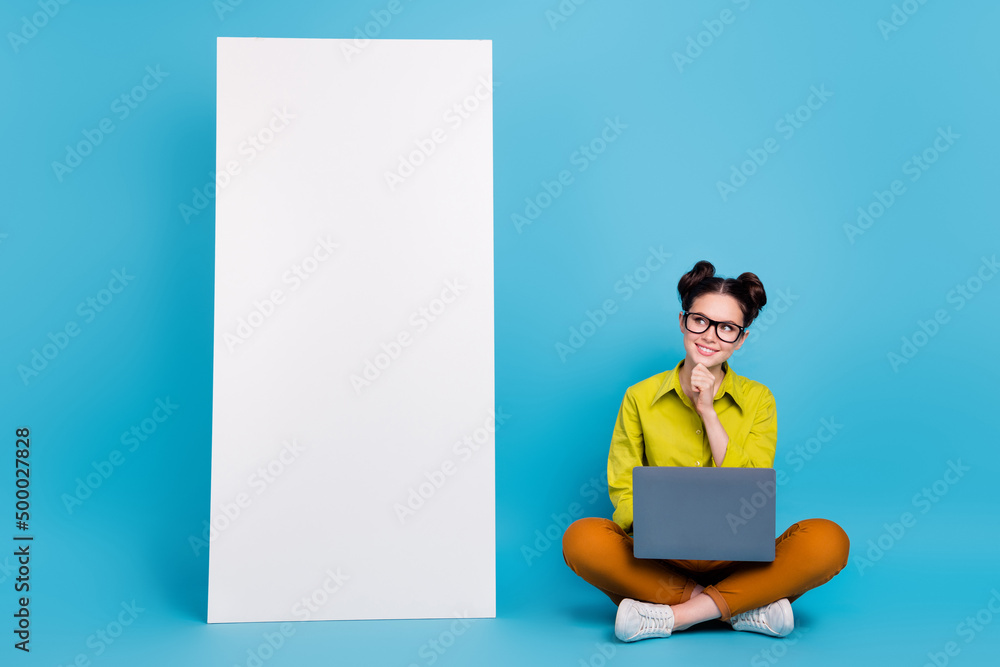 Aufkleber full size portrait of minded lady sit floor look empty space ui panel website isolated on blue color
