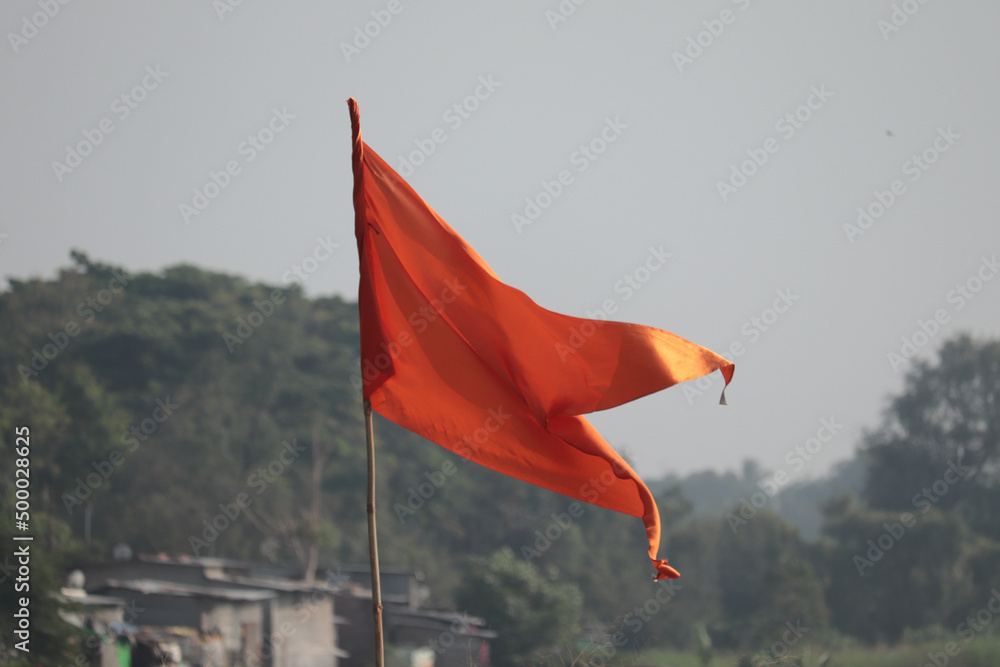 Canvas Prints Orange flag with blurred background