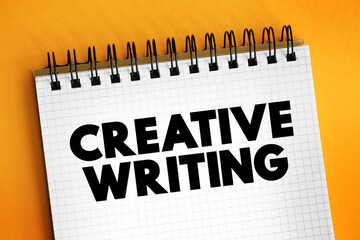 Creative Writing is writing that takes an imaginative, embellished, or outside-the-box approach to its subject matter, text concept on notepad
