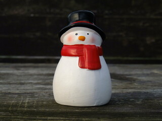 snowman on a wooden background
