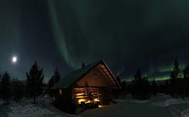Foto op Plexiglas Rustic log cabin with full moon and aurora borealis © Wirestock Creators